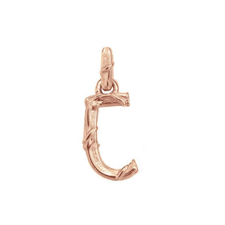 Karen Karch textured 18k rose gold charm in the shape of the letter 'C' with a vine-detail and rectangular bail on white background.