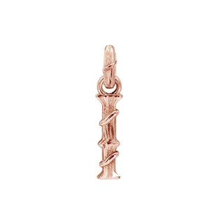Karen Karch textured 18k rose gold charm in the shape of the letter 'I' with a vine-detail and rectangular bail on white background.