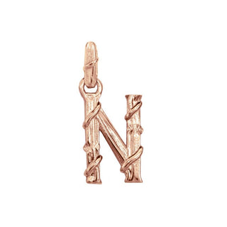Karen Karch textured 18k rose gold charm in the shape of the letter 'N' with a vine-detail and rectangular bail on white background.