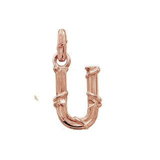 Karen Karch textured 18k rose gold charm in the shape of the letter 'U' with a vine-detail and rectangular bail on white background.