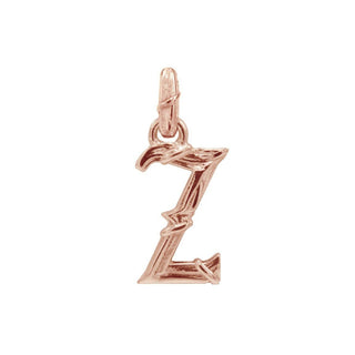 Karen Karch textured 18k rose gold charm in the shape of the letter 'Z' with a vine-detail and rectangular bail on white background.