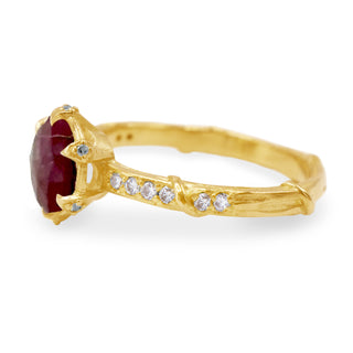 Karen Karch Diamond Studded Vine Round Ruby Rose Cut Solitaire 18k Yellow Gold Ring side view showing grtay diamond in each claw on white background.