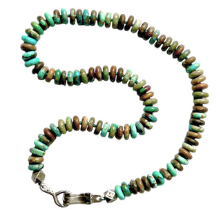 Multi -color turquoise button shape beads necklace with Karen Karch signature Clasp on a white background
