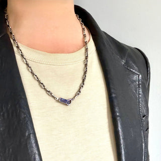 Karen Karch Silver Blue Sapphire Studded Clasp on handmade 2-hole weathered link chain on a neck, clasp centered. 