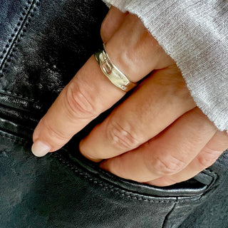Karen Karch Destiny Weathered Irregular edge 18k white gold 6mm band on hand.