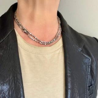 Karen Karch 32" Gray Diamond-stuuded Hooked Lithe with medium silver hook clasp on irregular silver beads shown doubled on neck.