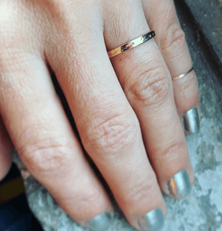Karen Karch Everlasting weathered 18k Yellow Gold Band on hand.