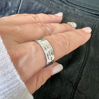Karen Karch Everpresent Weathered Irregular edge Platinum 7.5 mm band on hand. 