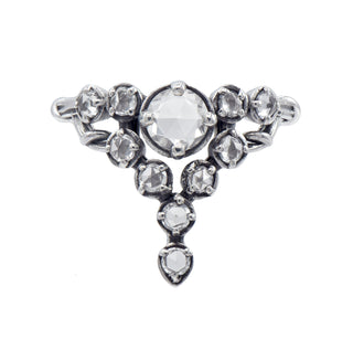 A Karen Karch Oxidized Sterling Silver  ring featuring a round rose cut white sapphire center stone surrounded by smaller white sapphires, in a star-like formation on a white background.