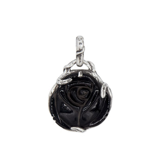Karen Karch Carved Black Onyx rose bud amulet with silver claw setting on a white background.