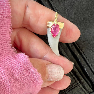 Karen Karch Draped Lucky Horn Amulet 18k Yellow Gold Ruby Moonstone Amulet o held in hand