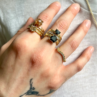 Hand styled with Karen Karch Jaipur collection in yellow gold, white gold and rose gold with black, champagne, and colorless diamonds.