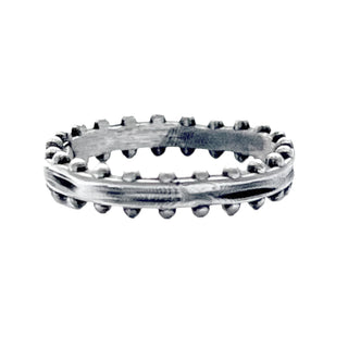 Karen Karch Jaipur Swing Silver textured ring with repeating ball details on both sidse on white background. 