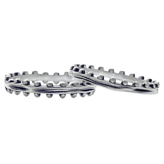Karen Karch Jaipur Swing and Sway 2-Ring Set.  Textured silver with balls on one side of band stacks with another band with balls on both sides.