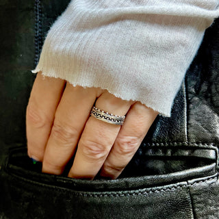 Karen Karch Jaipur Swing and Sway 2-Ring Set.  Textured silver with balls on one side of band stacks with another band with balls on both sides stacked on hand.