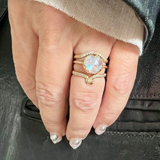 Karen Karch by Deme Wolfe 10k Yellow Gold Mystical Solitaire 9mm Rainbow Moonstone Riing on hand stack with 2 other lab diamond studded yellow gold rings.