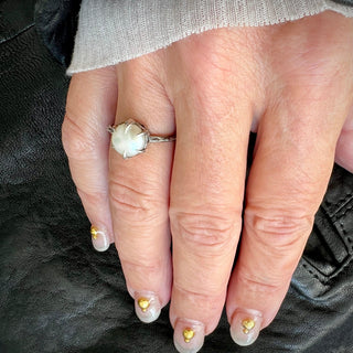 Karen Karch by Deme Wolfe white Pearl 925 sterling silver Solitaire Ring with Sharp claws on a hand