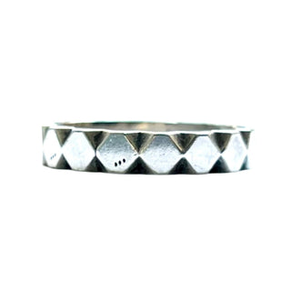 Karen Karch Outshine 3.8mm polished silver ring with a repeated angular pattern
