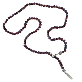 Karen Karch Garnet Faceted Square Bead Necklace with weathered silver Bar and pull through clasp on a white background