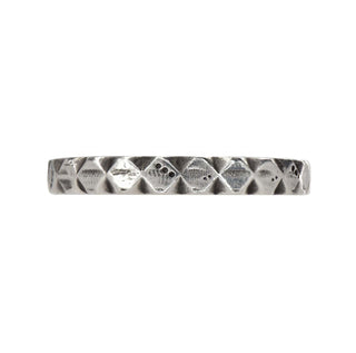 Karen Karch Outshine Weathered 3mm silver band with a textured, angular repeating pattern design , direct view, on white background.