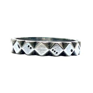 Karen Karch Weathered Outshine 3.85 mm wide silver ring with texture and geometric angular pattern on white 