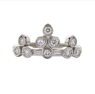 Karen Karch Turned Out Belgian Tiara Ring in Platinum with 10 diamonds in a crown like formation on a white background.