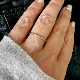 Karen Karch Willow Weathered Irregular edge platinum slender band on hand