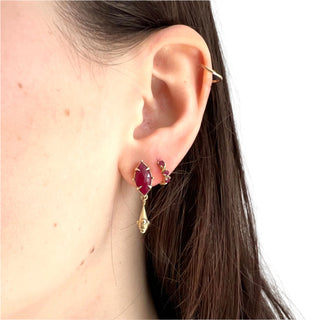 Karen Karch gold earrings featuring marquise-shaped ruby with ball-detailed gold drops and ruby studded vine slleper hoop on ear