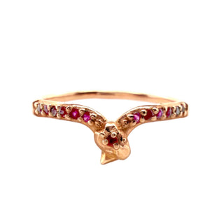 Karen Karch Rose Gold Ring with embedded gemstones on a white background