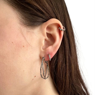 Karen Karch Silver Double Vine hoop on the ear styled with Vine Sleeper hoop