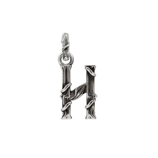 Karen Karch textured silver charm in the shape of the letter 'H' with a vine-detail and rectangular bail on white background.