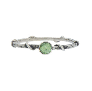 Karen Karch Silver Vine Stacker Ring with a bezel-set green sapphire on a white background.