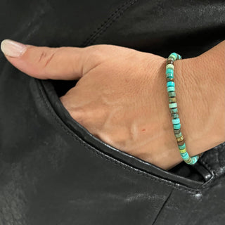 Karen Karch Silver Outshine Toggle Turquoise heshi bead bracelet on wrist.