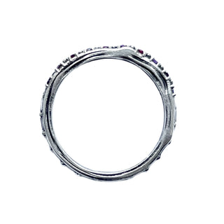 Karen Karch Jaipur Evermore Silver studded half eternity band with alternating rubies and pink sapphires, top view, on white background.