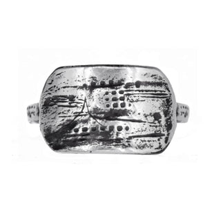 Karen Karch Unearthed Silver Tag Ring with a heavily textured design on a white background.