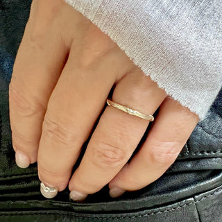 Karen Karch 18k white gold weathered texture Vine band on a hand.