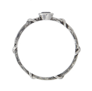Top view of a Karen Karch Silver Vine Stacker with a bezel-set brilliant cut black diamond on a white background.