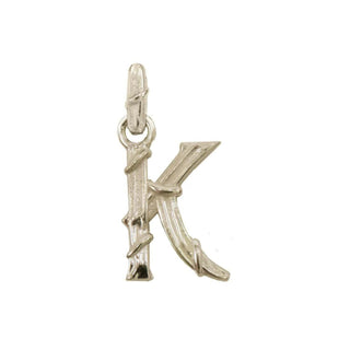 Karen Karch textured white gold charm in the shape of the letter 'K' with a vine-detail and rectangular bail on white background.