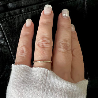 Karen Karch Willow Weathered Irregular edge 18k white gold slender band on hand