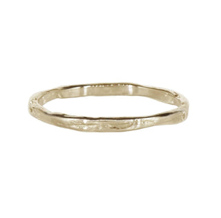 Karen Karch Willow Weathered Irregular edge 18k white gold slender band on white background. 