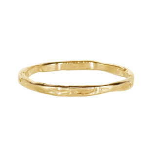 Karen Karch Willow Weathered Irregular edge 18k yellow gold slender band on white background. 