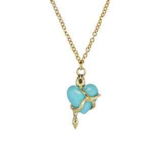 Karen Karch by Deme Wolfe Serpentine Love Turquoise Heart embraced by a 10k yellow gold snake on a gold filled chain on a white background.