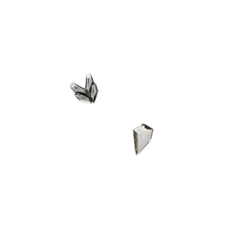 Karen Karch by Deme Wolfe Pair of silver mismatched arrowhead-shaped earrings on a white background