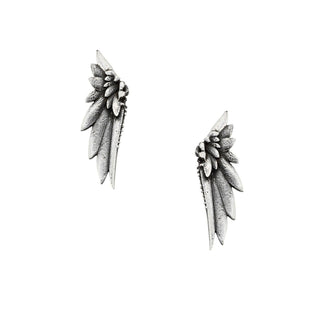 Karen Karch by Deme Wolfe pair of silver-colored earrings designed with a detailed wing motif, inspired by the mysticism of the desert.