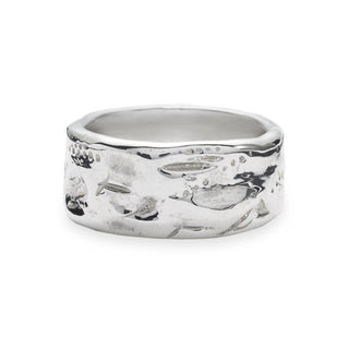 Wide Sterling Silver weathered worn in Band on a white background