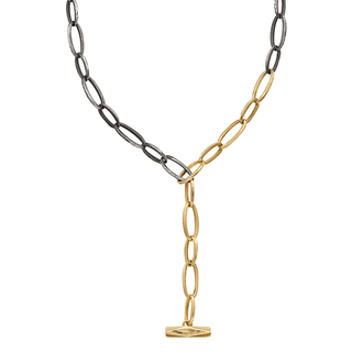 A Karen Karch Silver and Gold Textured Toggle Oval Chain Link Necklace designed to be worn in a lariat shape.