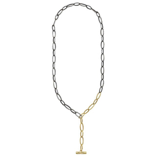 A Karen Karch Silver and Gold Textured Outshine Toggle Chain Necklace designed to be worn in a lariat shape, Full necklace on a white background