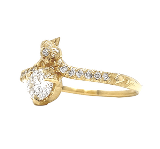 Karen Karch by Deme Wolfe Studded Snake Solitaire in 14k yellow gold an offset Lab Diamond, side view, on white background.