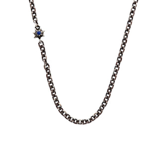 Karen Karch Long Silver Chain necklace with Lapis center Star shown close up.