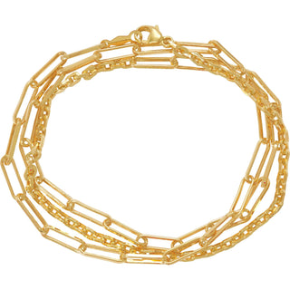 Karen Karch by Deme Wolfe Yellow Gold Filled 2 types of chain connected wrapped 3 times to wear as a bracelet on white background